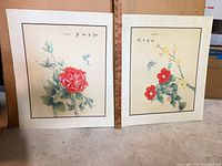 Both mounted prints side by side with ruler for scale