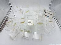 Group of clear acrylic display stands of various heights and widths