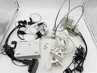 Group shot of all four lamps, power cords, adapters and IKEA box
