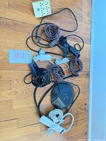 All eight electrical items laid out on floor