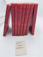 Spines of nine Happy Hollisters hardcovers