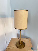 Lamp unlit showing full base, shade and swing arm retracted