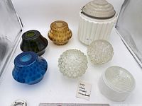 All six glass lamp shades grouped