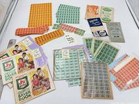 Overview of assorted stamp sheets, strips and booklets