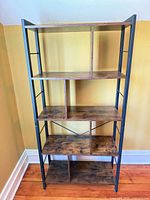 Front view of five-shelf VASAGLE bookcase showing overall structure