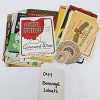 Stack of assorted vintage beverage labels