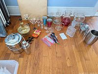 Full view of all barware items laid out on floor