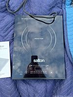 Top view of Salton induction cooktop showing surface and controls