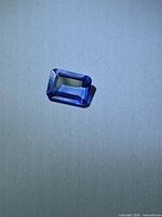 Front view of emerald-cut Tanzanite gemstone