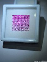 Square arrangement of 132 pink sapphires showing colour gradient