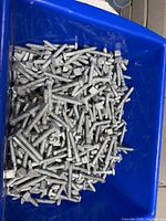 Close view of contents showing galvanized lag screws