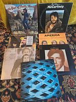 Group shot of all seven LP jackets