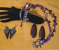 Full lot overview showing necklace, three bracelets and two pairs of earrings