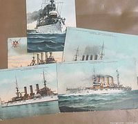 Fronts of five colour lithograph naval postcards