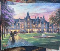 Estate at dusk canvas print on blue patterned surface