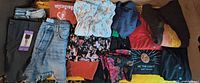 Assorted garments laid out showing variety