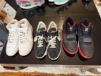 Overview of all three sneaker pairs on table