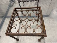 Top view showing scrollwork and square frame