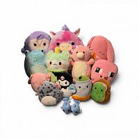 Full group shot of all plush arranged in heart shape