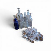 Front view of all bottles and loose stoppers grouped together