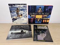Front view of all four canoeing and kayaking books displayed together