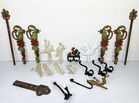 Full lot overview showing curtain bracket parts, hooks, opener