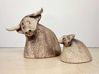 Bull and cow figurines together