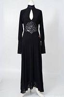 Front view of black ballroom dance dress on mannequin