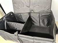 Organizer open showing interior compartments and dividers