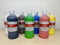 All seven Handy Art acrylic paint bottles lined up
