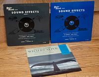 Front covers of all three LPs displayed upright