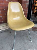 Front three-quarter view of fiberglass chair