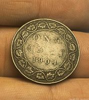 Reverse of 1904 Canadian Large Cent showing wreath and date
