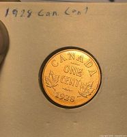 Reverse view showing date 1928 and maple leaf design