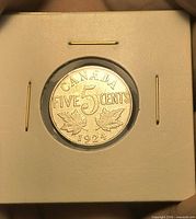 Reverse showing CANADA FIVE CENTS 1924 with maple leaves
