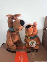 Front view of Scooby-Doo and Scrappy-Doo plush toys