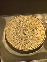 Reverse of coin showing Queen Mother cameo and date