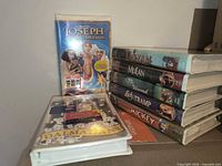Front and side view of sealed VHS tapes including Joseph: King of Dreams and 101 Dalmatians