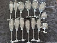 All 13 clear glass stemware pieces laid out