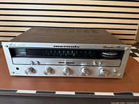 Front angled view of Marantz 2216 receiver showing full faceplate and cabinet