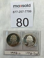 Obverse of both 1998-S proof quarters in holders