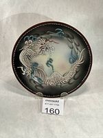 Full frontal view of plate showing complete dragon design and condition