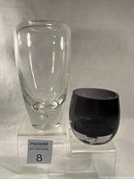 Both Krosno vases side by side on acrylic blocks