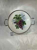 Front view entire tray showing grape design and handles