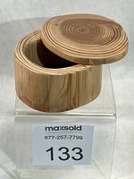 Box open showing swivel lid and interior lining