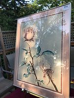 Front view of framed print showing rose imagery, mat and frame