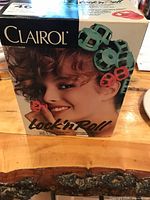 Front of Clairol Lock 'n Roll box showing product image