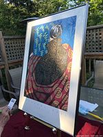 Front view of framed Cressida Bell print with imagery visible