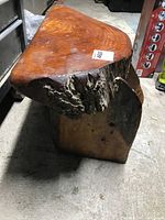 Stool side view showing live bark edge and slab legs
