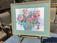 Framed Dawna Darton floral print on easel